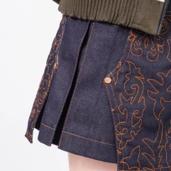 [ANDERSSON BELL] EMBROIDERY PANEL PLEATED DENIM SKIRT _ DENIM